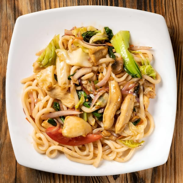 Sen Noodle House's stir-fried udon noodles with chicken, bok choy, mushrooms, and other vegetables.